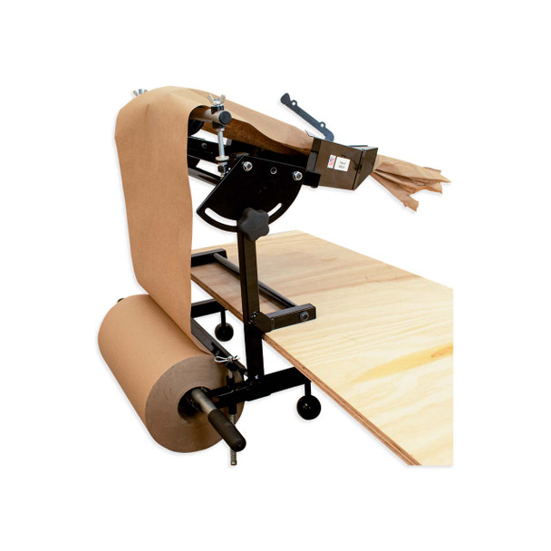 Side view of EP-5955 Kraft Paper Crumpler mounted to packing bench with paper feeding through void fill system