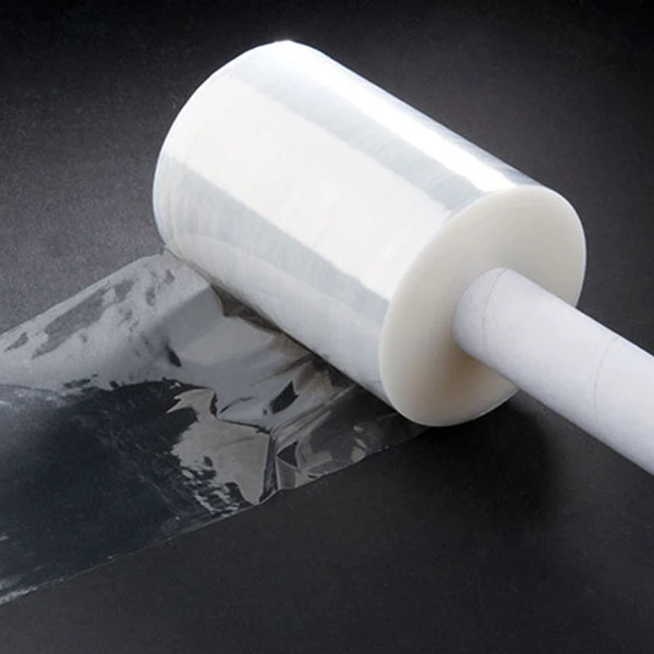 Hand cast stretch film on a black surface
