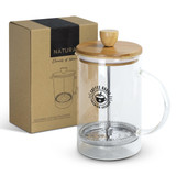A glass coffee plunger with a bamboo lid and handle, presented alongside its kraft packaging.