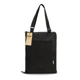 A black quilted picnic blanket with a shoulder strap and a large pocket, featuring a logo on the side.