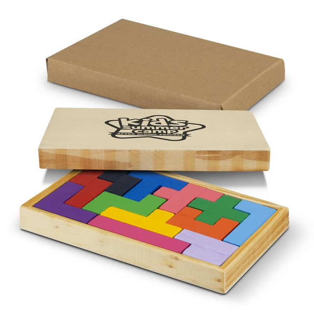 A wooden pentomino puzzle in vibrant colours, displayed in a rectangular box with a logo on the lid.