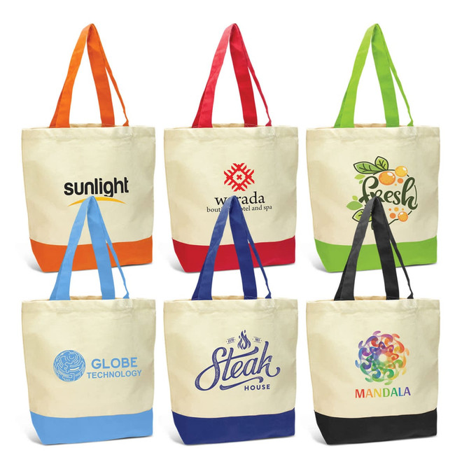 A collection of canvas tote bags in various colours, featuring different logos and designs.