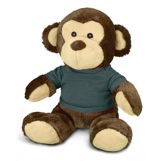 A brown and tan monkey plush toy wearing a green shirt, featuring cute facial details and soft limbs.