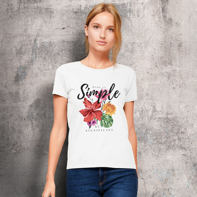 A white women's organic t-shirt featuring floral graphics and a logo on a textured background.