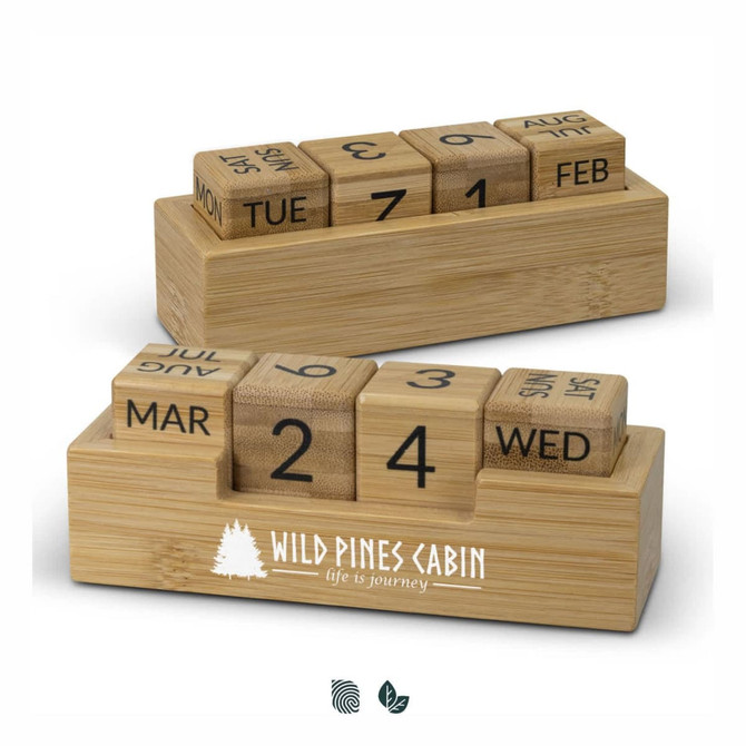 A bamboo desk calendar featuring engraved wooden blocks for days, months, and dates, with a white logo.