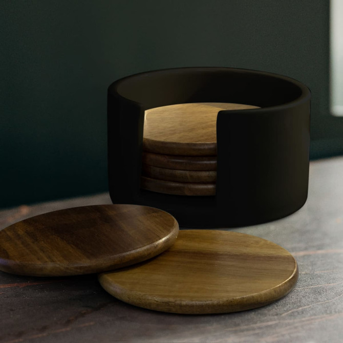 A set of wooden coasters in a black holder, featuring a mix of light and dark wood.