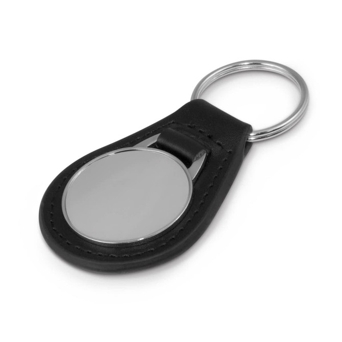 A round leather key ring featuring a sleek metallic surface and a sturdy key ring attachment.