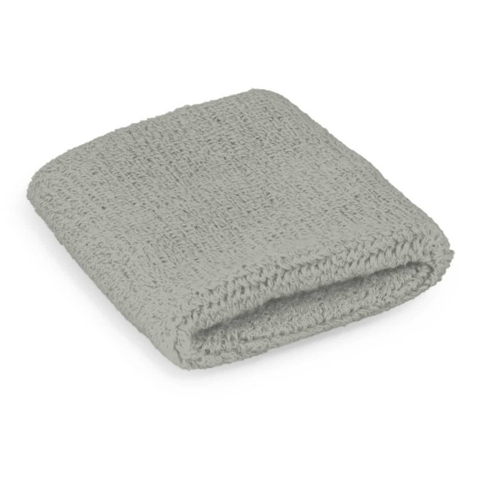A grey wrist sweat band folded neatly, showcasing a textured fabric with an elastic design. It features a logo branding.