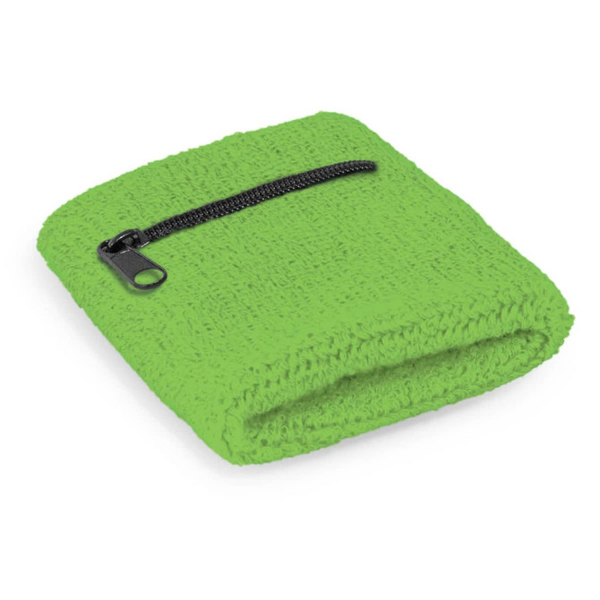 A green wrist sweat band with a black zippered pocket, featuring a textured fabric design.