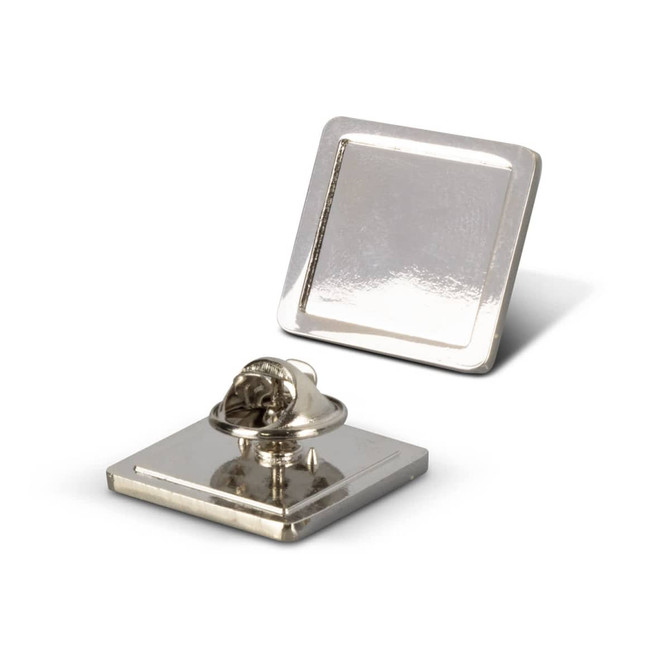 A square small lapel pin with a shiny metallic finish, featuring a secure pin backing for attachment.