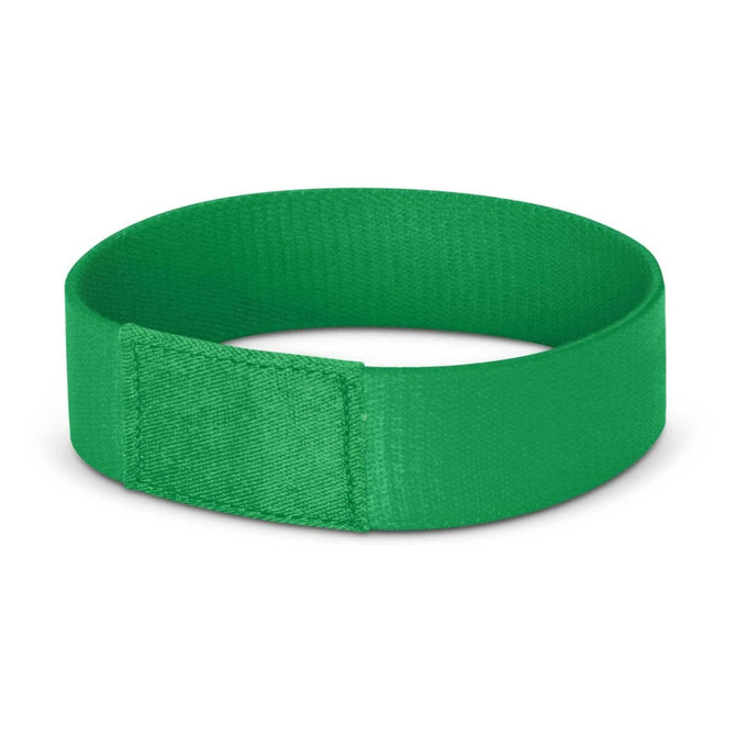 A green wristband with a smooth finish, featuring a simple design and a logo on the side.