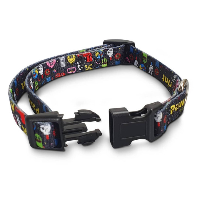 A black dog collar with a vibrant, multi-coloured pattern featuring various cartoonish designs and a plastic buckle.