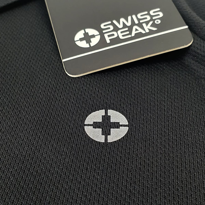 A black polo shirt featuring a subtle logo, with a tag indicating the brand Swiss Peak.