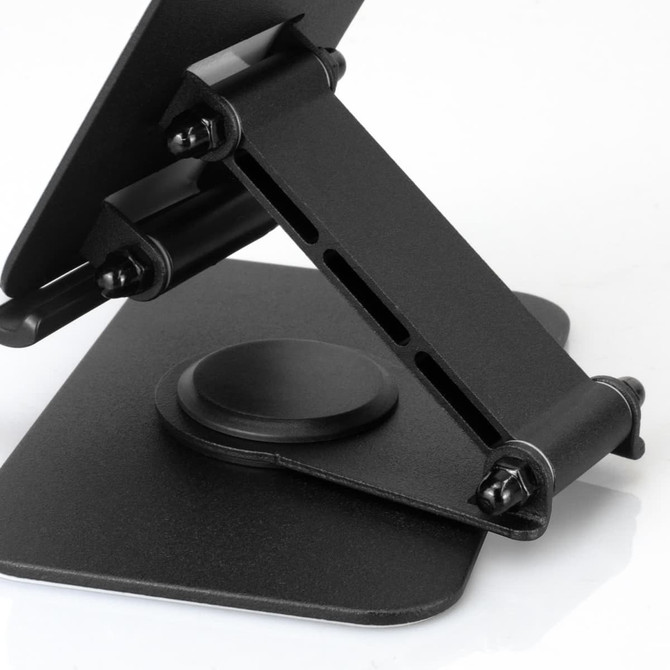 A black metal phone and tablet stand with an adjustable support arm and a circular base. It features a logo.