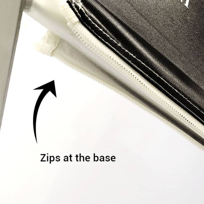 A close-up of a media wall's zipper mechanism at the base, featuring a black fabric edge.