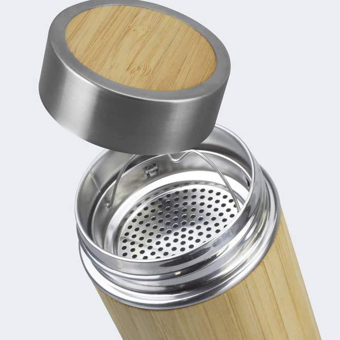 A drink bottle made of bamboo with a stainless steel lid and a mesh filtration insert visible inside.