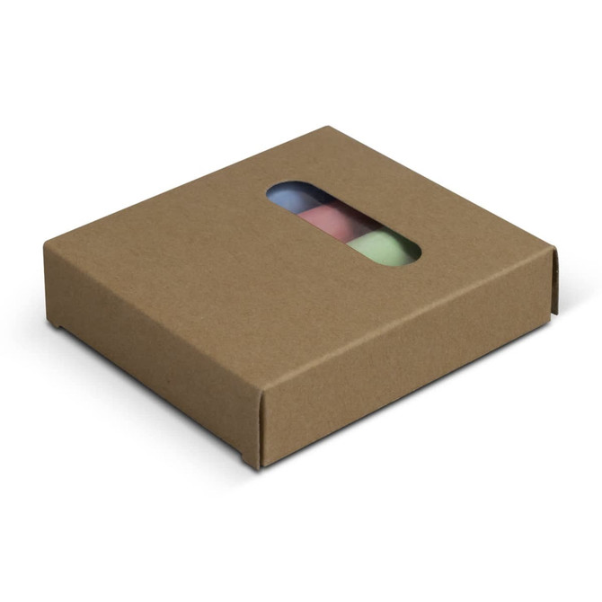 A brown cardboard box containing jumbo sidewalk chalk in pink, blue, and green. The box has a clear window.