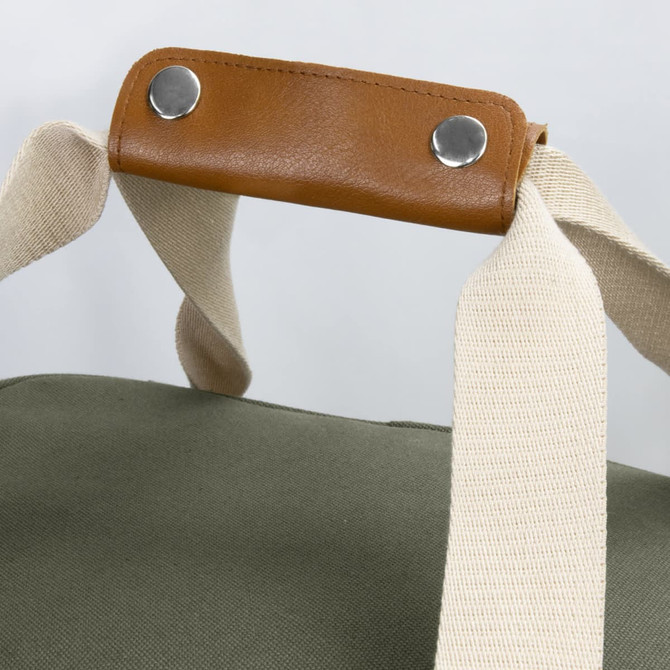 A green cooler bag featuring beige fabric straps and a brown handle with silver snaps.