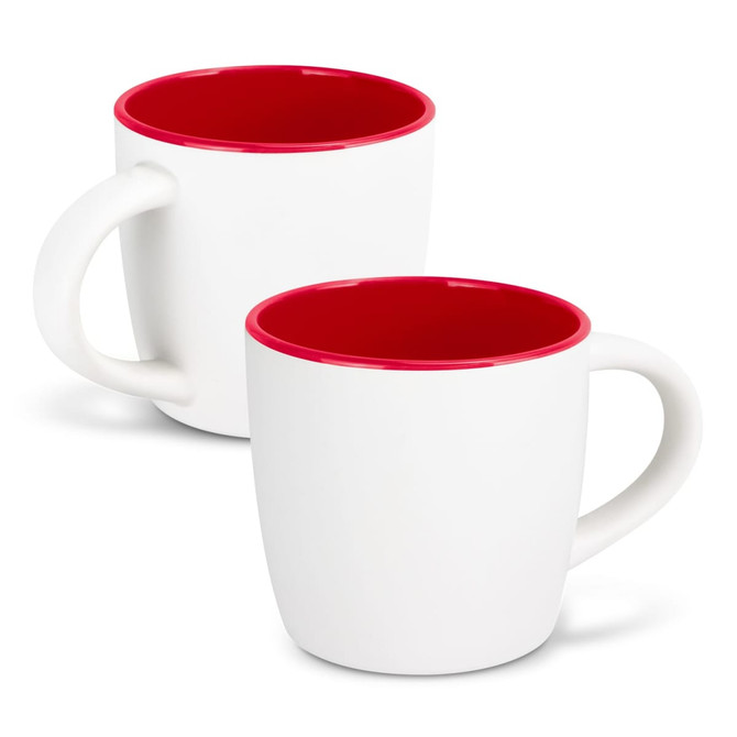 A two-tone coffee mug featuring a white exterior and a red interior, with a curved handle and a logo.