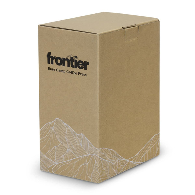 A brown cardboard box featuring mountain graphics and a logo, containing the Frontier Base Camp Coffee Press.
