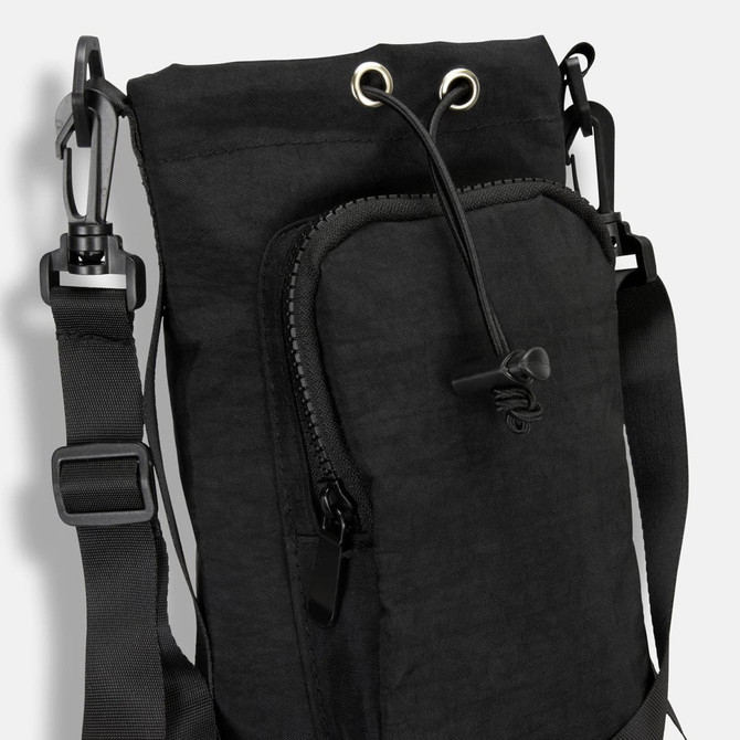 A drink bottle bag in black with a zippered pocket, adjustable strap, and attachment clips.
