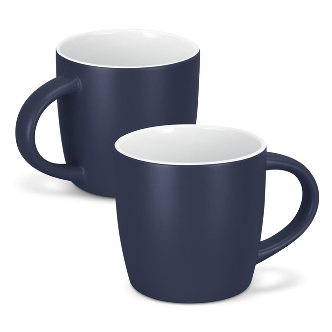 A drinkware set featuring two navy blue coffee mugs with white interiors and curved handles. One mug is slightly behind the other.