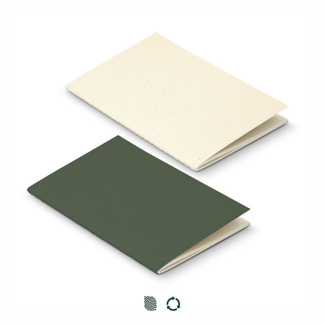 A soft cover notebook featuring a cream and dark green recycled paper design, with a logo visible on the surface.