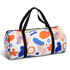 A colourful duffle bag featuring abstract shapes in orange, blue, and pink, with black handles. It has a logo.
