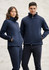 A navy softshell jacket featuring zip pockets and a high collar, worn by a man and a woman. The image has a subtle background.