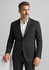 A man in a dark grey wool stretch blazer, featuring a two-button front and a classic fit, stands confidently.