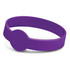 A purple silicone wristband with a debossed circular design. It features a logo on its surface.