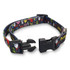 A black dog collar with a vibrant, multi-coloured pattern featuring various cartoonish designs and a plastic buckle.