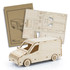 A wooden model of a van in natural wood colour, accompanied by instructional sheets and design templates.