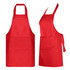 A red Dali Youth Apron featuring a front pocket, designed for workwear, with adjustable neck and waist ties.