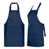 A navy blue Dali Youth Apron featuring a front pocket and adjustable neck strap, with a logo present.