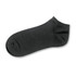 A black ankle sock with a smooth texture and a ribbed cuff, featuring a logo on the side.