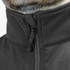 A close-up of a black soft shell jacket featuring a high collar and zip closure, with branding visible.