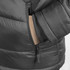 A black puffer jacket features a zippered pocket and cuff detailing, showcasing a sleek and functional design.