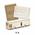 A wooden model bus kit with unassembled parts and instructions. The model is light wood in colour.