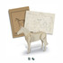A wooden horse model kit with a light natural finish and assembly instructions in the background.