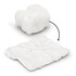 A compressed white towel, transforming from a small compact shape to a flat, textured cloth, with water droplets nearby.