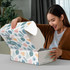 A rectangular die cut box with a locking lid, featuring a floral pattern in greens, blues, and peach tones.