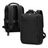 A black soft-touch daily backpack featuring adjustable straps and a sleek design, with a logo on it.