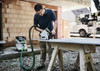 Festool TS 55 plunge saw in use with guide rail and dust extraction.