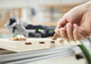 DOMINO dowels being fitted into timber joints created with the Festool DF 500