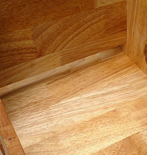 view of grains on wooden toddler chair