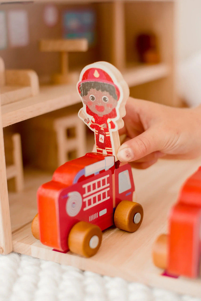 wooden fire engine and fire fighter toy