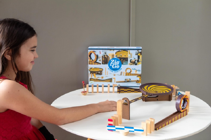 Djeco Zig & Go with young girl playing