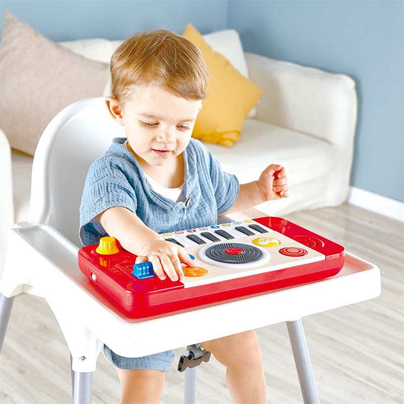 Kid Playing with Electronic Kids Piano DJ Mix & Spin