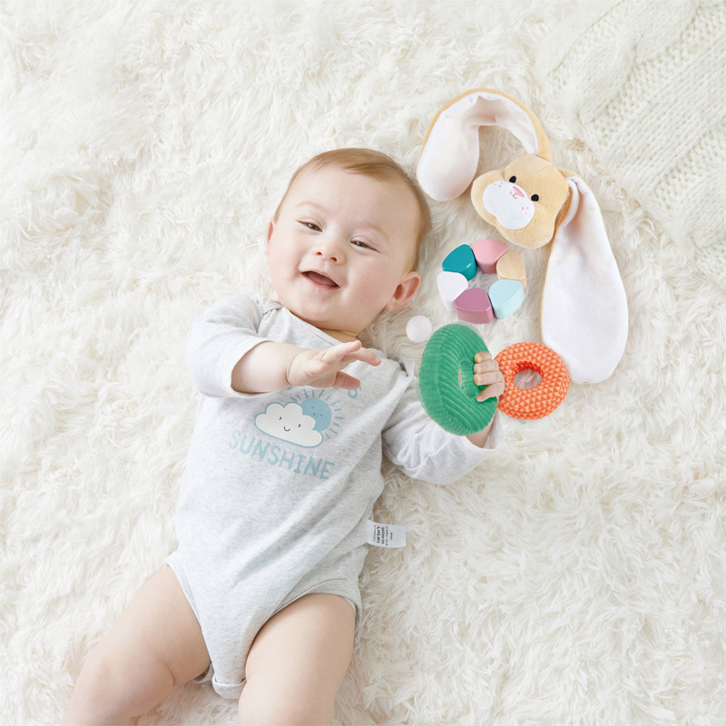 Baby Playing with Bunny Stacker